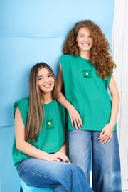 Green t-shirt with detachable prints