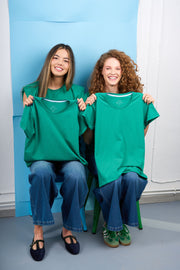 Green t-shirt with detachable prints