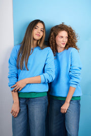Light blue sweatshirt with detachable print